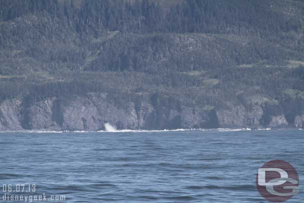 The waves were crashing fairly high on the rocks to be visible from this far off shore.  This was taken with my 300mm telephoto lens