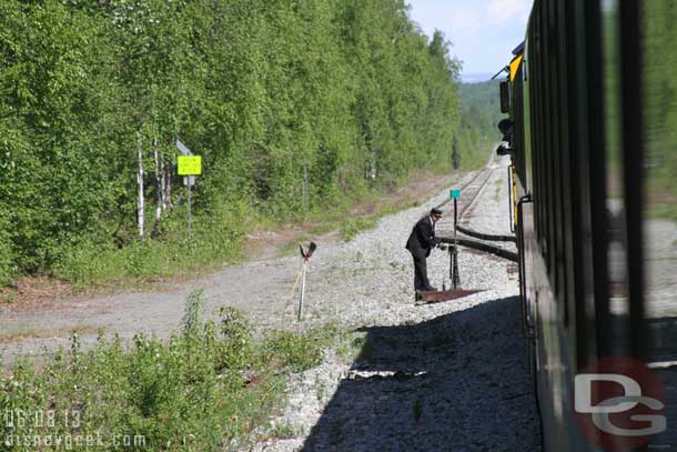We pulled off into another siding in Sunshine Alaska to wait for another southbound train to pass.  Someone had to get out of the train and go throw the switch.