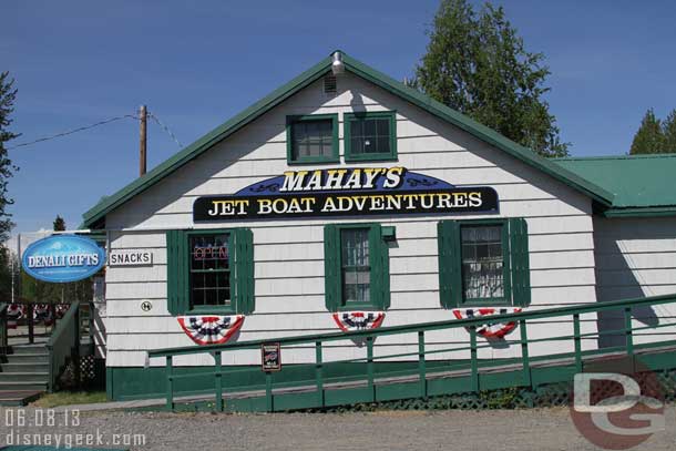 The bus dropped us off in a gravel lot near the Jet Boat Adventures.