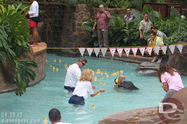 There was also a cast member in the water shooting video at the finish line.