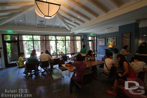 The room features several tables that are used for activities throughout the day.
