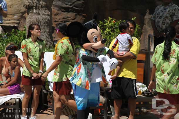 Mickey exited the area and headed to the far side of the pool for pictures.