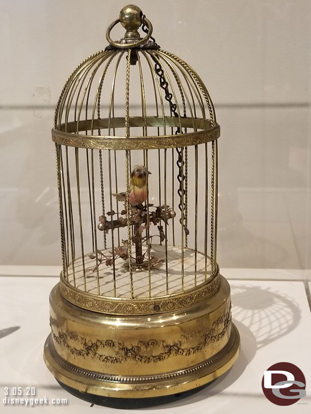 In a case nearby the Automation Bird Cage that inspired audio animatronics