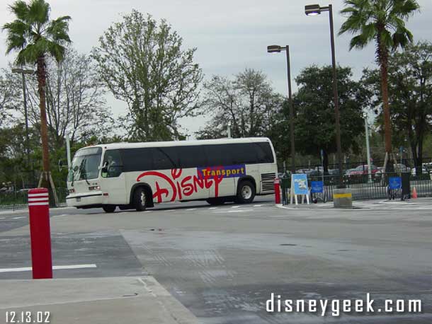 A bus rounding the corner at the Studios bus stops.