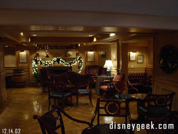 Off to the side of the Yacht Club Lobby is a small bar area.
