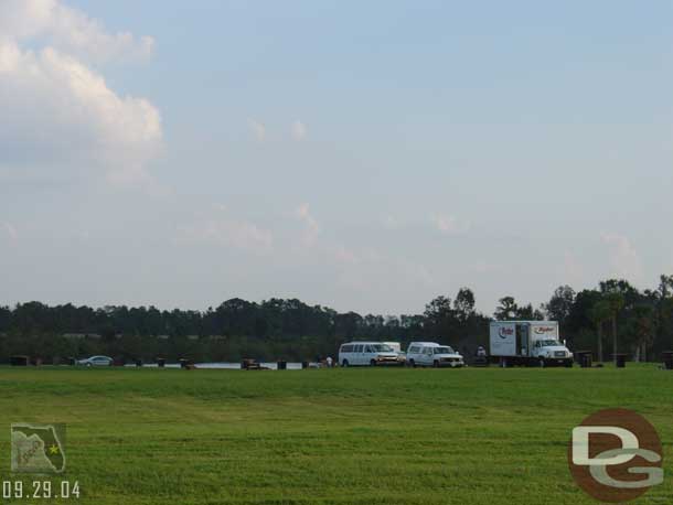 A private party was being set up along the Seven Seas Lagoon, not far from the bus stops