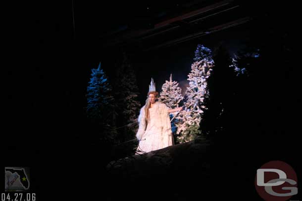 The Ice Princess appears above the crowd on a catwalk for a brief time.