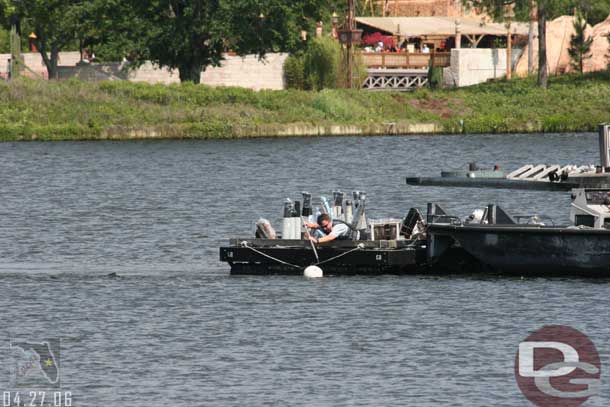 They were setting up for the evenings performance of Illuminations.  I never realized they have to catch they buoys by hand.