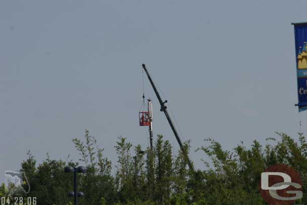 We start off waiting for a bus again at Pop Century.. here is a better shot of them working on that cell tower in the distance for another day.