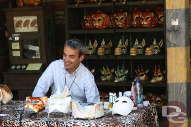 I did not grab a picture of his sign, but he is the artist who makes the masks they sell