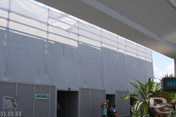 The facade of the old Skyway/restroom building is being worked on, the restrooms are still open