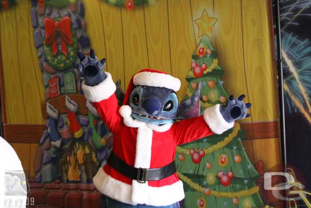 After the presentations Stitch came out for pictures in front of a holiday backdrop (this covered the Illuminations one I showed early).