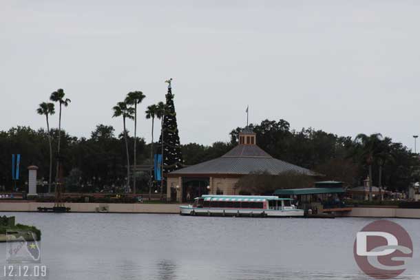 The tree looks kind of lonely without the giant white arches behind it.