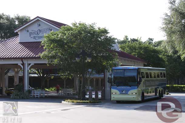 Looking back at the lobby, with a Magical Express bus at the stop.