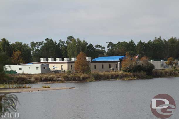 Off to the far side of the lake are what appears to be construction trailers.