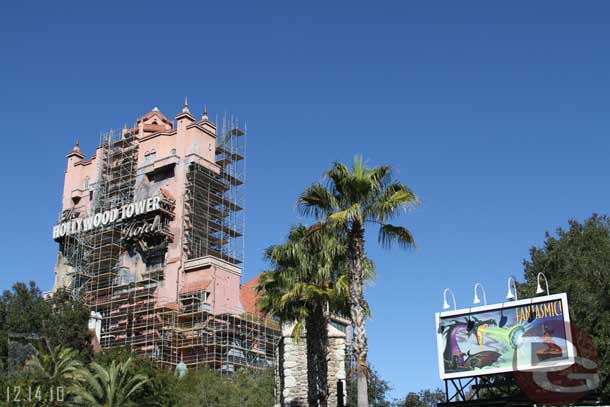 Tower is being worked on.  No tarps and the attraction was operating.