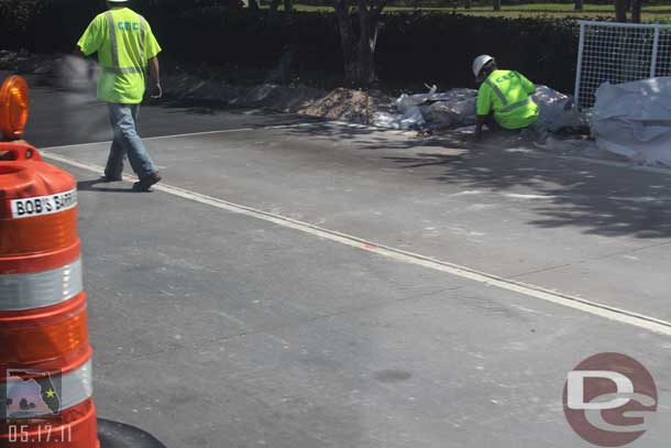 On the way to the Magic Kingdom, they poured more of the concrete for the bus lane at the tollbooth.