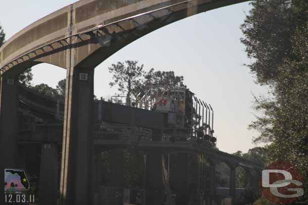 The spur line for the monorail is done and a work tractor is parked there.