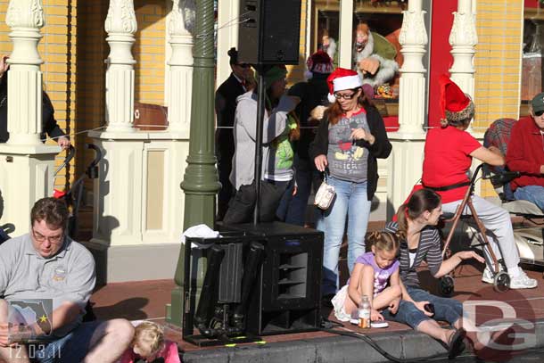 Speakers and other gear are set up along the street.