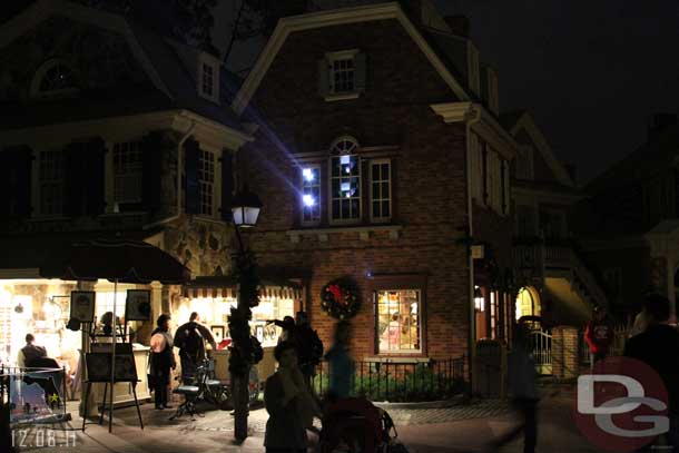 After the show hung out in Liberty Square for a while to let the crowds leave.  While there noticed there were projectors for the side of the castle inside one the second story of the Christmas shop.  Never really noticed thought about it.  So there are 4 banks of projectors?  Tomorrowland, Main Street East, Main Street West, and Liberty Square?