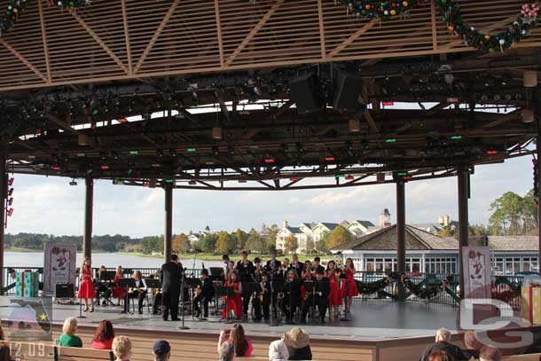 A group performing on the stage as part of the performing arts showcase.