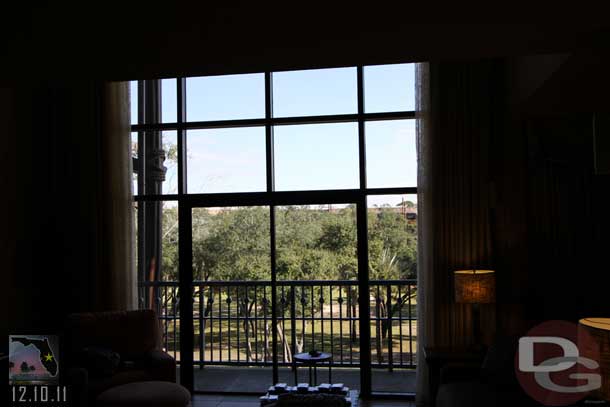 In front of you is a two story window looking out at the Savanna.