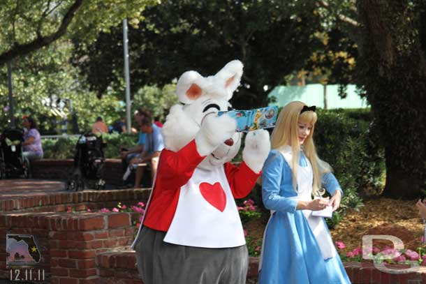 Alice and the White Rabbit out for pictures.