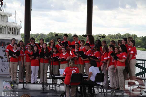 A choir performing, thought the baseball outfits were interesting.