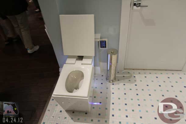 This is a smart toilet which has an automatic lid.