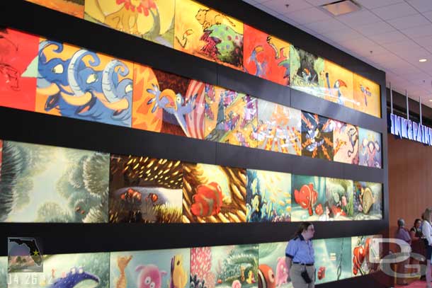 These large murals/tiles of animation art line the wall to the left. (For those familiar with Pop Century this building is the same, just configured slightly differently).  