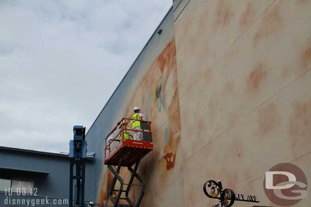 Work on the Pirates sound stage exterior was going on.  They were painting a mural.