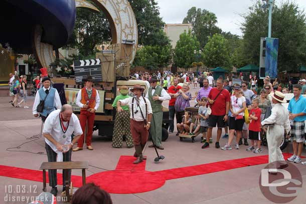 Several groups of the Citizens of Hollywood doing a joint performance at the end of the street.