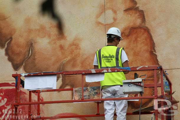 Back by the map work.  Notice how he has print outs of how it is supposed to look on the lift.  Also noticed it was Buena Vista Construction and not WDI painting.