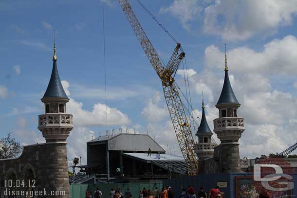 Plenty of activity in Fantasyland.  Thought this showed the scale nicely, notice the worker on the roof of the Mine Train building.