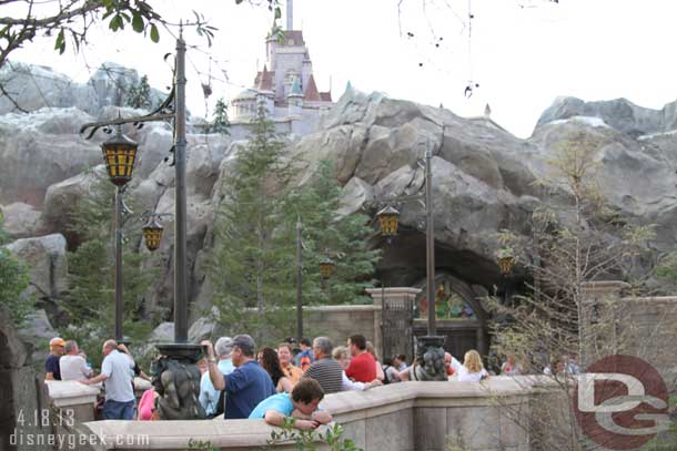 A lot of guests milling around outside Be Our Guest waiting to be seated, or for their dining time.