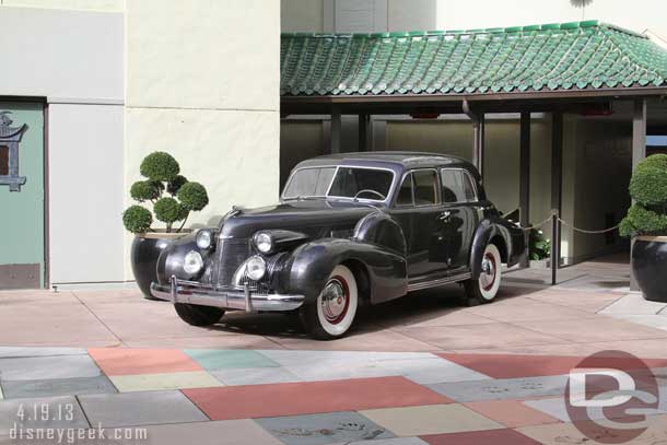 A car parked in the Chinese Theater courtyard.