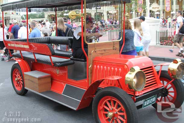 The Main Street vehicles were out in force this morning.  Here is a red horseless carriage.