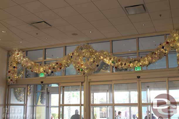 Garland and more wreaths over the entrance doors.