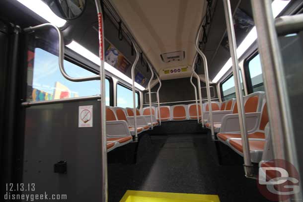 The rear of the bus is similar to other buses with seats and some standing space.