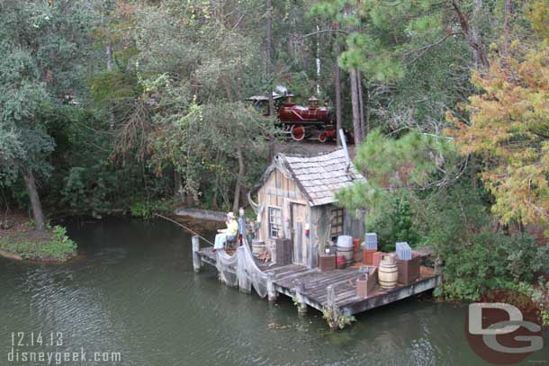 A train catching and passing us as we cruised the Rivers of America