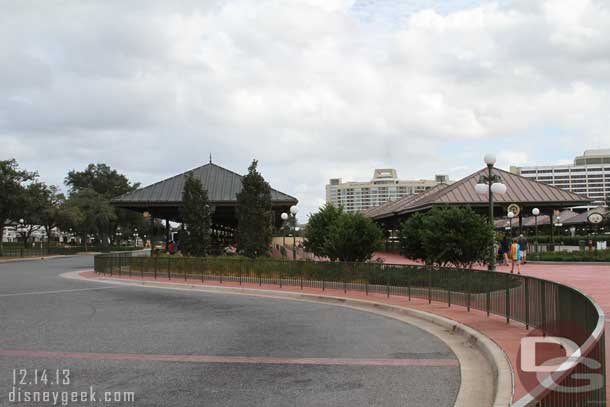 Walking toward the bus stops.