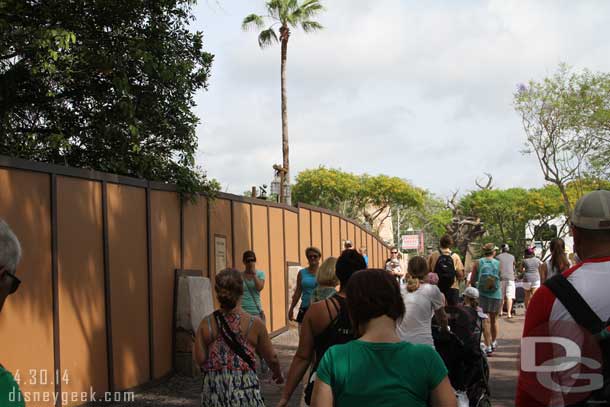 There is still a construction wall up along the walkway blocking your view of the new Lion King theatre.