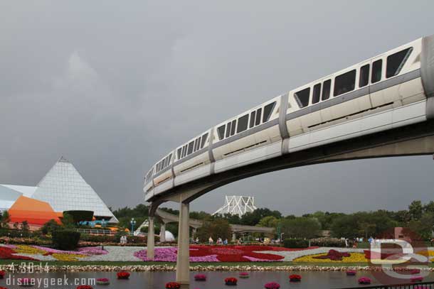 Some of the flower beds for the Flower and Garden Festival with monorail Gray Passing overhead.  