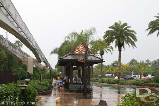 Making my way out to the Polynesian Bus stop.  It is not really made for rain, rather small and wide open on all sides.