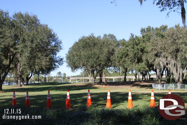 The grass was coned off for parking.