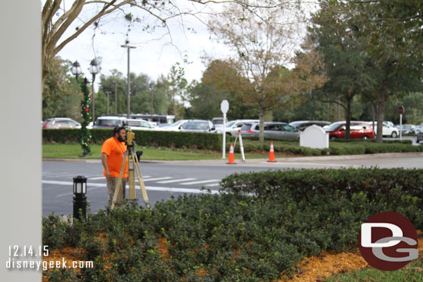 A survey team out near the driveway.