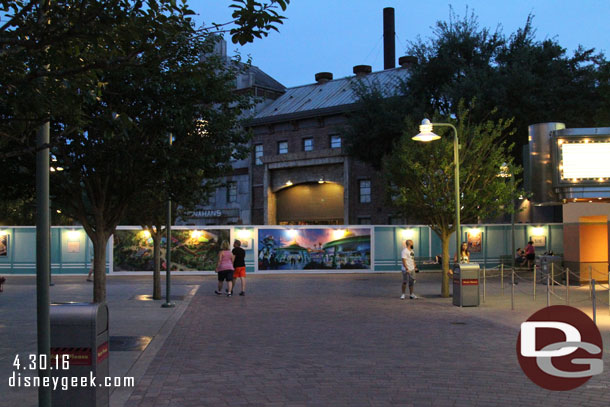 A wall is at the end of Pixar Place, right before the Backlot buildings.  The guests down there are either lost, looking at the wall, or smoking.