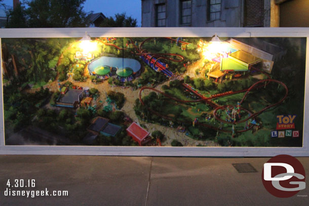 The wall features some concept art for Toy Story Land.