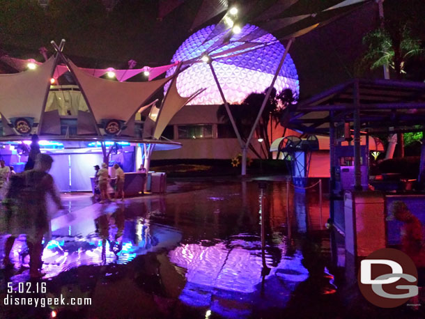 A smaller pond of water further along offers a nice reflection of Spaceship Earth.  Thought about taking out the camera to get better pics but with the drizzle and splashing it seemed like a bad idea.