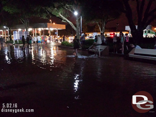 More flooding approaching the bus stops.  Notice all the guests in the planters trying to avoid the water.